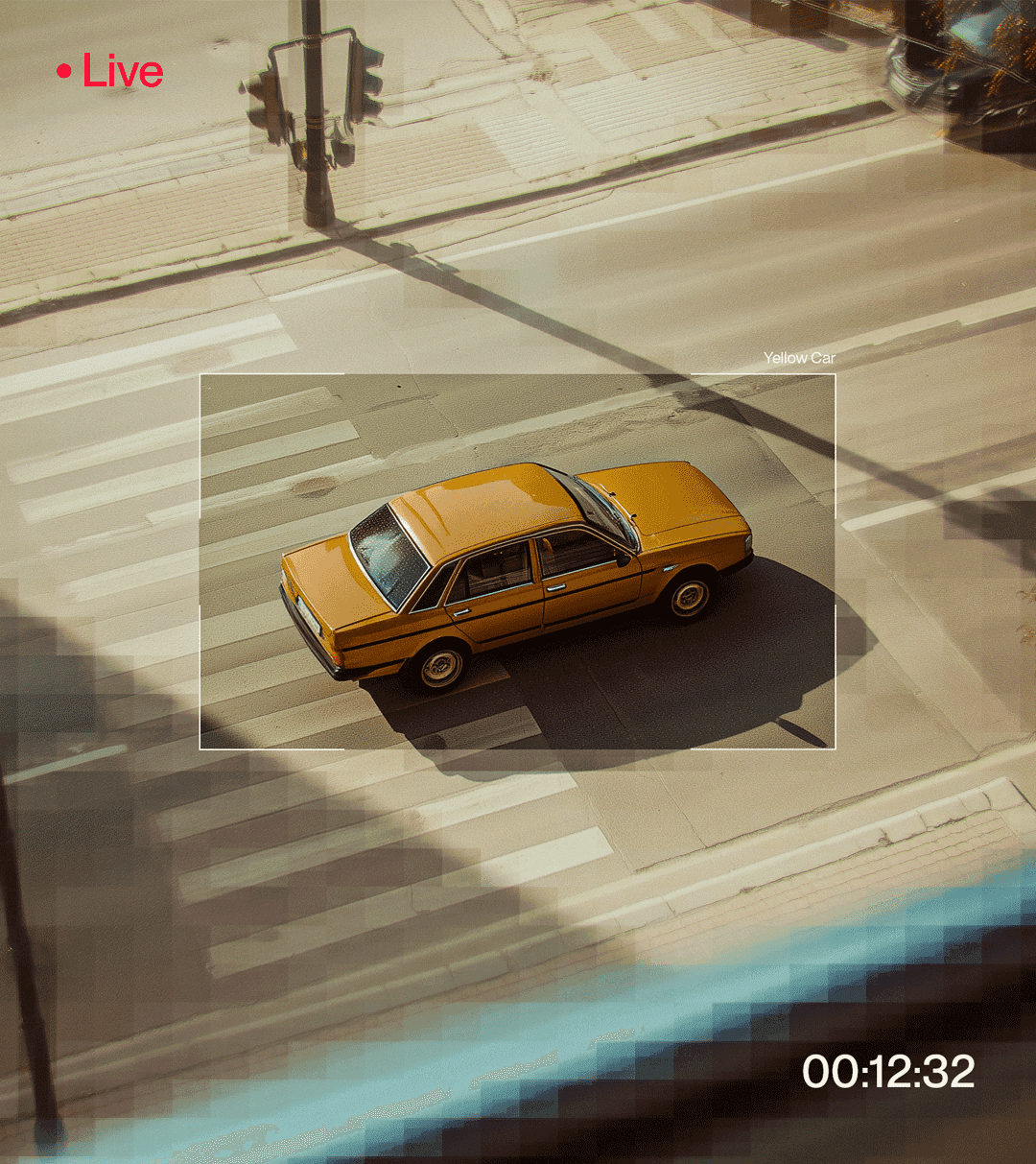 A yellow car marked by a tracking box, a Live indicator and a timestamp.
